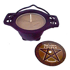 Sandalwood candle in cauldron